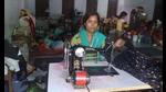 Punam Prajapti using her sewing machine for stitching clothes at a flood relief camp in Gorakhpur. (HT photo) Punam Prajapti using her sewing machine for stitching clothes at a flood relief camp in Gorakhpur. (HT photo)