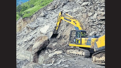 Boulders being removed during the restoration work of the Shimla-Kinnaur highway on Tuesday which was closed due to a landslide at Jeori. (ANI) Boulders being removed during the restoration work of the Shimla-Kinnaur highway on Tuesday which was closed due to a landslide at Jeori. (ANI)