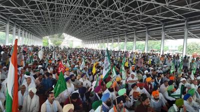 The kisan mahapanchayat of the Samyukt Kisan Morcha (SKM) at Karnal’s grain market Tuesday. (HT Photo) The kisan mahapanchayat of the Samyukt Kisan Morcha (SKM) at Karnal’s grain market Tuesday. (HT Photo)