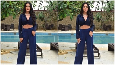 Esha wore the monotone look with printed stilettos, emerald and stone choker necklace, matching earrings, and rings. She left her luscious tresses open in a middle parting, and for glam, she went with blushed cheeks, nude-pink-tinted lips, glowing skin, winged eyeliner, smoky eye shadow, and sharp contour. (HT Photo/Varinder Chawla) Esha wore the monotone look with printed stilettos, emerald and stone choker necklace, matching earrings, and rings. She left her luscious tresses open in a middle parting, and for glam, she went with blushed cheeks, nude-pink-tinted lips, glowing skin, winged eyeliner, smoky eye shadow, and sharp contour. (HT Photo/Varinder Chawla)