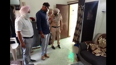 Punjab Police at the crime scene in Phase 11, Mohali, on Tuesday. Punjab Police at the crime scene in Phase 11, Mohali, on Tuesday.