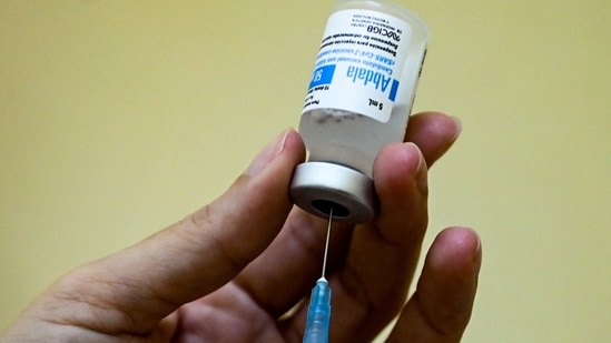 A nurse prepares a dose of the Abdala Covid-19 vaccine in Havana.(AFP)
