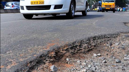 At least 2,000 kms of roads in the city are damaged or have potholes, according to the state government, which have cost many lives over the years. (Samuel Rajkumar) At least 2,000 kms of roads in the city are damaged or have potholes, according to the state government, which have cost many lives over the years. (Samuel Rajkumar)