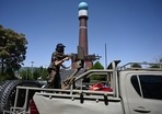 A member of the Taliban Fateh fighter, a "special forces" unit, patrol on a vehicle around Massoud square in Kabul A member of the Taliban Fateh fighter, a "special forces" unit, patrol on a vehicle around Massoud square in Kabul
