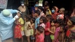 A healthcare worker collects swab samples of the underprivileged children for Covid-19 RT-PCR test in Kolkata.(ANI Photo) A healthcare worker collects swab samples of the underprivileged children for Covid-19 RT-PCR test in Kolkata.(ANI Photo)