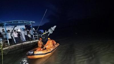 NDRF personnel hold rescue operation after two boats carrying several passengers collided in the Brahmaputra river in Jorhat on Wednesday. (ANI)