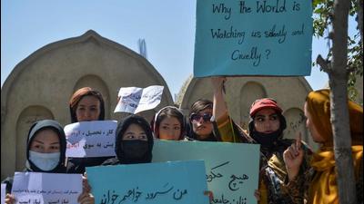 Afghan women hold banners and placards as they take part in an anti-Pakistan protest in Kabul on Wednesday. China hopes the Taliban-led Afghanistan will build an inclusive political structure and stay committed to a moderate domestic and foreign policy. (AFP) Afghan women hold banners and placards as they take part in an anti-Pakistan protest in Kabul on Wednesday. China hopes the Taliban-led Afghanistan will build an inclusive political structure and stay committed to a moderate domestic and foreign policy. (AFP)