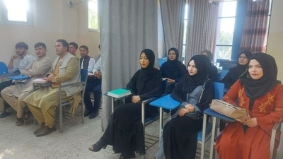 Students attend class under new classroom conditions at a university in Kabul on September 6. (Reuters Photo) Students attend class under new classroom conditions at a university in Kabul on September 6. (Reuters Photo)