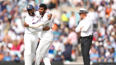 India's Jasprit Bumrah, second left, celebrates taking the wicket of England's Ollie Pope on day five of the fourth Test match at The Oval cricket ground in London, Monday, Sept. 6, 2021. (AP Photo/Kirsty Wigglesworth) (AP)