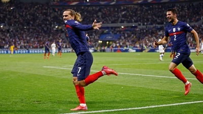 France's Antoine Griezmann celebrates scoring their second goal with Leo Dubois&nbsp; (REUTERS)