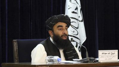 Taliban spokesman Zabihullah Mujahid speaks during a press conference in Kabul, Afghanistan Tuesday. The Taliban on Tuesday announced a caretaker Cabinet stacked with veterans of their harsh rule in the late 1990s and subsequent 20-year battle against the U.S.-led coalition and its Afghan government allies. (AP) Taliban spokesman Zabihullah Mujahid speaks during a press conference in Kabul, Afghanistan Tuesday. The Taliban on Tuesday announced a caretaker Cabinet stacked with veterans of their harsh rule in the late 1990s and subsequent 20-year battle against the U.S.-led coalition and its Afghan government allies. (AP)