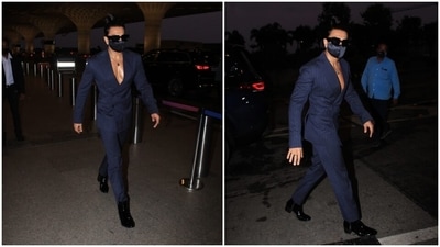 Ranveer, who is known for his quirky and sometimes bizarre-yet-stylish fashion choices, proved why he is known as the king of quirk with his airport outfit today. However, the highlight of his look was his hairstyle. (HT Photo/Varinder Chawla)