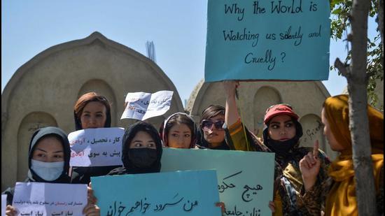 Afghan women hold banners and placards as they take part in an anti-Pakistan protest in Kabul on Wednesday. China hopes the Taliban-led Afghanistan will build an inclusive political structure and stay committed to a moderate domestic and foreign policy. (AFP) Afghan women hold banners and placards as they take part in an anti-Pakistan protest in Kabul on Wednesday. China hopes the Taliban-led Afghanistan will build an inclusive political structure and stay committed to a moderate domestic and foreign policy. (AFP)