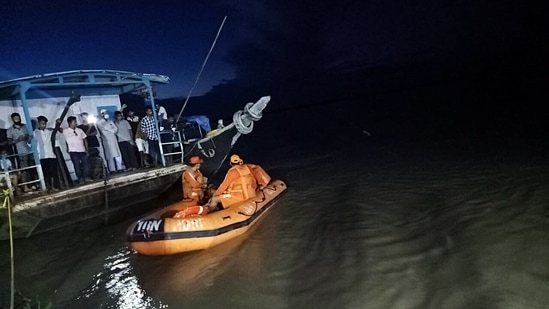 NDRF conducts a rescue operation as Two boats carrying approximately 120 passengers collided in the Brahmaputra river in Jorhat on Wednesday.(ANI) NDRF conducts a rescue operation as Two boats carrying approximately 120 passengers collided in the Brahmaputra river in Jorhat on Wednesday.(ANI)
