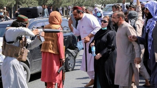 Several netizens commenting below the photograph saluted the woman for her "bravery", but also expressed concern over the fact that any attempts at identifying the woman might lead to potential retribution from the Taliban.&nbsp;(REUTERS)