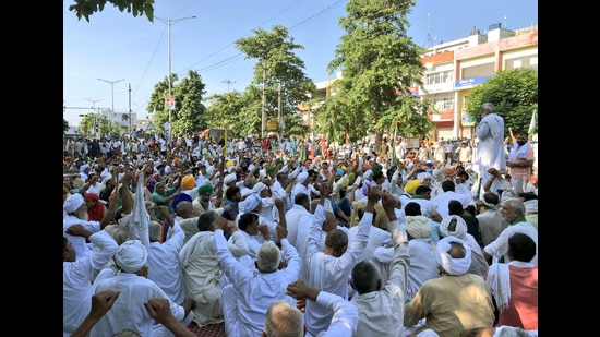 Farmers shout slogans during a gherao of Karnal secretariat, in Karnal on Wednesday. (ANI Photo) (ANI)