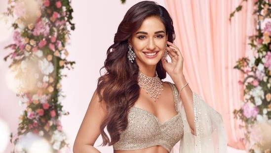 Disha Patani in ivory bralette and lehenga gives the most stunning bridesmaid look(Instagram/@dishapatani)