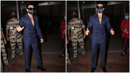 No look of Ranveer Singh is complete without his infamous quirky element. And he made sure to make his jet-set outfit look cool by rocking it with a double ponytail. Yes, you read that right. The actor tied his hair in a sleeked-back style. What do you think of his look?(HT Photo/Varinder Chawla)