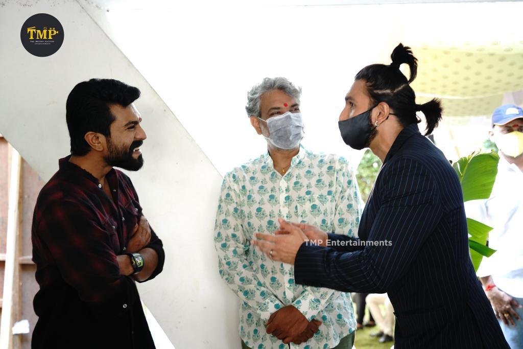 Ranveer Singh interacting with Ram Charan and SS Rajamouli.&nbsp;