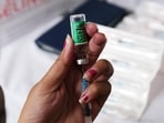 A health worker prepares a dose of the Covishield vaccine, developed by Oxford-AstraZeneca Plc. and manufactured by Serum Institute of India Ltd.(Bloomberg file photo) A health worker prepares a dose of the Covishield vaccine, developed by Oxford-AstraZeneca Plc. and manufactured by Serum Institute of India Ltd.(Bloomberg file photo)