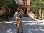 A Taliban fighter stands near a building in Panjshir province, northeastern of Afghanistan, on Wednesday. A Taliban fighter stands near a building in Panjshir province, northeastern of Afghanistan, on Wednesday.