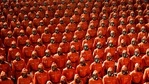 In this photo provided by the North Korean government, North Korean troops wearing gas masks and bright red suits parade during a celebration of the nation’s 73rd anniversary that was overseen by leader Kim Jong Un, at Kim Il Sung Square in Pyongyang, North Korea, early Thursday, Sept. 9, 2021. (Korean Central News Agency/Korea News Service via AP) In this photo provided by the North Korean government, North Korean troops wearing gas masks and bright red suits parade during a celebration of the nation’s 73rd anniversary that was overseen by leader Kim Jong Un, at Kim Il Sung Square in Pyongyang, North Korea, early Thursday, Sept. 9, 2021. (Korean Central News Agency/Korea News Service via AP)