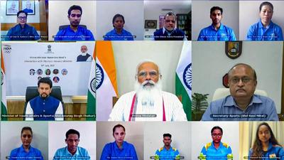 Prime Minister Narendra Modi interactis with Indian athletes' contingent bound for Tokyo Olympics in July. The PM can legitimately claim that his government has done more than others in building an Olympic medal momentum. But political control over sport federations must be tackled . (PTI) Prime Minister Narendra Modi interactis with Indian athletes' contingent bound for Tokyo Olympics in July. The PM can legitimately claim that his government has done more than others in building an Olympic medal momentum. But political control over sport federations must be tackled . (PTI)