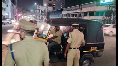 Police personnel during a night duty in Kochi. (ANI)