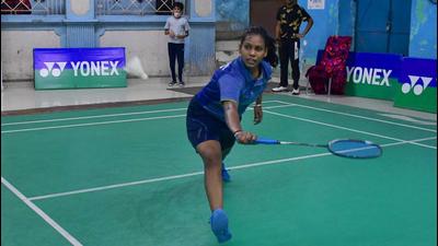 A player in action during the badminton championship at Shastri Badminton Hall in Ludhiana on Thursday. (Harsimar Pal Singh/HT)