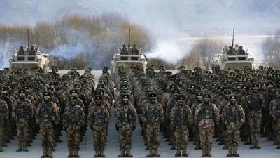 In this file photo, Chinese soldiers train in Kashgar, Xinjiang Uighur Autonomous Region. The remote Chinese regions of Xinjiang and Tibet bordering India will soon have 30 airports at the disposal of the Western Theatre Command to facilitate the movement of PLA personnel. (AP) In this file photo, Chinese soldiers train in Kashgar, Xinjiang Uighur Autonomous Region. The remote Chinese regions of Xinjiang and Tibet bordering India will soon have 30 airports at the disposal of the Western Theatre Command to facilitate the movement of PLA personnel. (AP)