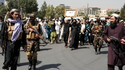Taliban soldiers stand in front of protesters during the anti-Pakistan protest in Kabul, Afghanistan. (Reuters Photo) Taliban soldiers stand in front of protesters during the anti-Pakistan protest in Kabul, Afghanistan. (Reuters Photo)