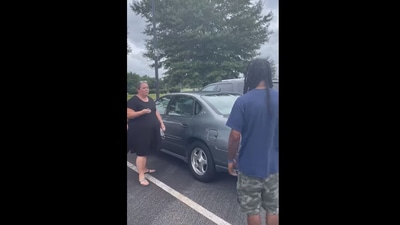 The image shows the car being gifted to the custodian. (Facebook/@UnityGroveElementary  )