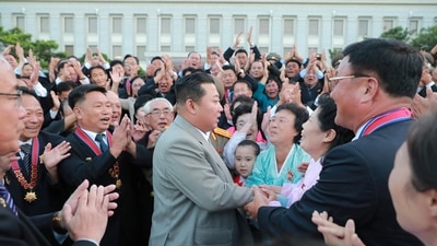 North Korean leader Kim Jong Un greets people during an event to mark the 73rd founding anniversary of North Korea in Pyongyang. (via Reuters)