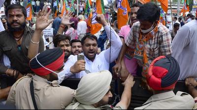 BJP members protesting against the Ludhiana Improvement Trust chairperson on Thursday. (Harsimar Pal Singh/Hindustan Times) BJP members protesting against the Ludhiana Improvement Trust chairperson on Thursday. (Harsimar Pal Singh/Hindustan Times)