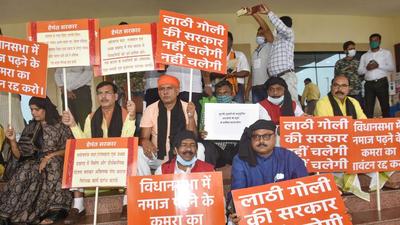 BJP leaders wear black ribbons during their protest against allotment of a separate namaz room for Muslim MLAs inside the Jharkhand Assembly, in Ranchi, Thursday. (PTI) BJP leaders wear black ribbons during their protest against allotment of a separate namaz room for Muslim MLAs inside the Jharkhand Assembly, in Ranchi, Thursday. (PTI)