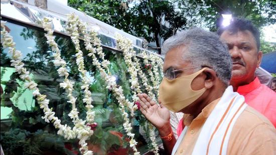 West Bengal BJP President and MP Dilip Ghosh during the funeral of party worker Abhijit Sarkar, who was allegedly killed in post-poll violence by Trinamool Congress, at BJP headquarters in Kolkata, Thursday. (PTI) West Bengal BJP President and MP Dilip Ghosh during the funeral of party worker Abhijit Sarkar, who was allegedly killed in post-poll violence by Trinamool Congress, at BJP headquarters in Kolkata, Thursday. (PTI)