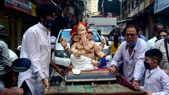 The Maharashtra government has also restricted the height of idols to four feet for public celebrations and to two feet for household celebrations. (Photo by Anshuman Poyrekar/Hindustan Times)(Anshuman Poyrekar/HT PHOTO)