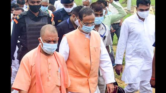 UP chief minister Yogi Adityanath inspects preparations for the inauguration of Raja Mahendra Pratap State University at village Lodha, in Aligarh, Wednesday, (PTI Photo)