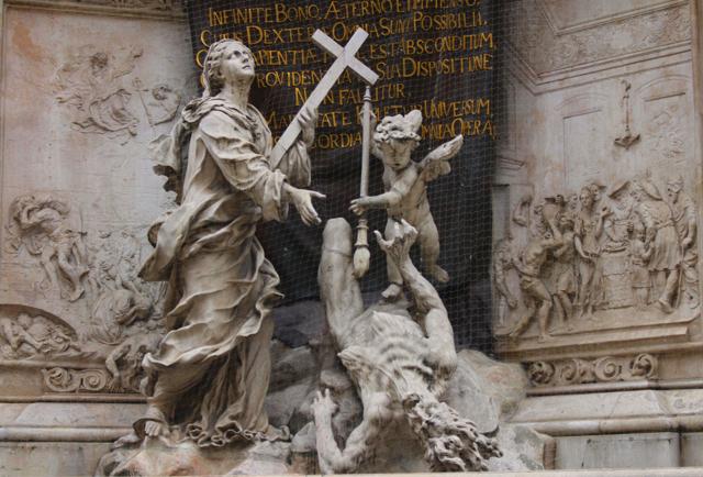 Stone sculptures on the plague monument of the Holy Trinity in Vienna. The figures depict a plague patient with an angel flying over him and a saint with a cross alongside. (Shutterstock) Stone sculptures on the plague monument of the Holy Trinity in Vienna. The figures depict a plague patient with an angel flying over him and a saint with a cross alongside. (Shutterstock)