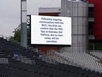 A message displayed on a screen at the Old Trafford ground in Manchester, England, Friday Sept. 10, 2021. The fifth and final test of the cricket series between England and India has been canceled barely an hour before play was due to start following a coronavirus outbreak in the India camp.(AP) A message displayed on a screen at the Old Trafford ground in Manchester, England, Friday Sept. 10, 2021. The fifth and final test of the cricket series between England and India has been canceled barely an hour before play was due to start following a coronavirus outbreak in the India camp.(AP)