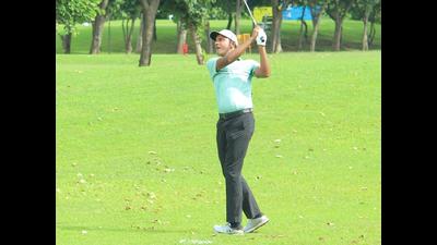 Veer Ahlawat in action during TATA Steel PGTI Players Championship at Panchkula Golf Club on Friday. (HT PHOTO)