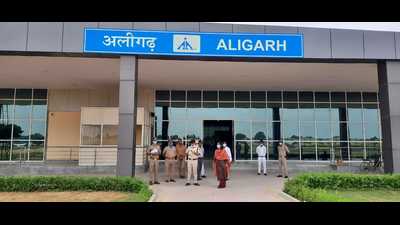 District magistrate of Aligarh J Selva Kumari and SSP Aligarh Kalanidhi Naithani checking arrangements at the Dhanipur airstrip where the Prime Minister’s plane would land. (HT photo)