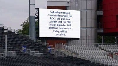 A message displayed on a screen at the Old Trafford ground in Manchester, England, Friday Sept. 10, 2021. The fifth and final test of the cricket series between England and India has been canceled barely an hour before play was due to start following a coronavirus outbreak in the India camp. (AP) A message displayed on a screen at the Old Trafford ground in Manchester, England, Friday Sept. 10, 2021. The fifth and final test of the cricket series between England and India has been canceled barely an hour before play was due to start following a coronavirus outbreak in the India camp. (AP)