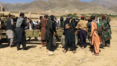 Taliban soldiers gather with weapons and machinery in Panjshir province. (AP) Taliban soldiers gather with weapons and machinery in Panjshir province. (AP)