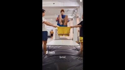 The image shows the man attempting to jump into shorts. (Instagram/@team1llusion)