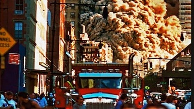 Image of the huge cloud of smoke and dust rising from the demolished twin towers of the World Trade Center displayed at an exhibition. (PTI) Image of the huge cloud of smoke and dust rising from the demolished twin towers of the World Trade Center displayed at an exhibition. (PTI)