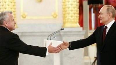 President Vladimir Putin shakes hands with the new US Ambassador to Russia John Sullivan during a ceremony for newly appointed foreign ambassadors to Russia, at the Kremlin in Moscow (via REUTERS)