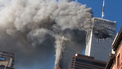 Smoke rises from the burning twin towers of the World Trade Center after hijacked planes crashed into the towers on September 11, 2001 in New York City. (AP)