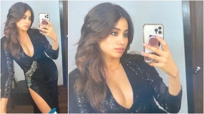 Janhvi Kapoor flaunts her curves in this thigh-high slit black shimmery dress. (Instagram/@janhvikapoor)