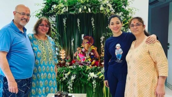 Tamannaah Bhatia is celebrating Ganesh Chaturthi as well as her mother's birthday. She took to her Instagram handle to share a photo with her family and captioned it, "What an auspicious day… Celebrating Ganesh Chaturthi and Mom’s birthday. Wishing you all a very happy Ganesh Chaturthi ."(Instagram/@ tamannaahspeaks)